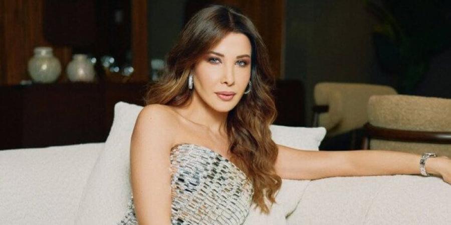 نانسي عجرم تنشر برومو ألبومها الجديد.. «قائمة بالأغاني» - بلس 48